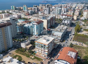 Готовая к проживанию, квартира 1+1, 65м², в комплексе с бассейном в районе субботнего рынка в Махмутларе, Алания ID-18528 фото-1