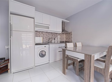 Готовая к проживанию, квартира 1+1, 65м², в комплексе с бассейном в районе субботнего рынка в Махмутларе, Алания ID-18528 фото-5