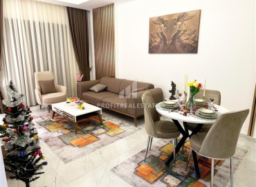 Апартаменты 1+1, 60м², с дизайнерским интерьером и видом на горы в комфортабельной новостройке в центре Махмутлара, Алания ID-18531 фото-2