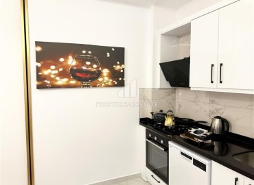 Апартаменты 1+1, 60м², с дизайнерским интерьером и видом на горы в комфортабельной новостройке в центре Махмутлара, Алания ID-18531 фото-5