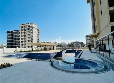 Апартаменты 1+1, 60м², с дизайнерским интерьером и видом на горы в комфортабельной новостройке в центре Махмутлара, Алания ID-18531 фото-12