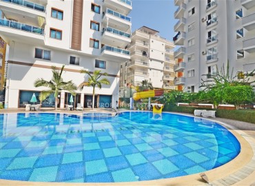 Готовая к проживанию, квартира 2+1, 100м², в комплексе с инфраструктурой на центральной улице Махмутлара, Алания ID-18533 фото-1