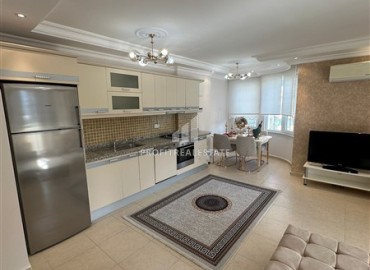 Элегантная квартира с двумя спальнями, 120м², в уютном комплексе в 400 метрах от моря в Махмутларе, Алания ID-18538 фото-3