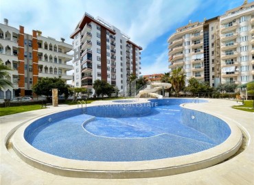 Элегантная квартира с двумя спальнями, 120м², в уютном комплексе в 400 метрах от моря в Махмутларе, Алания ID-18538 фото-12