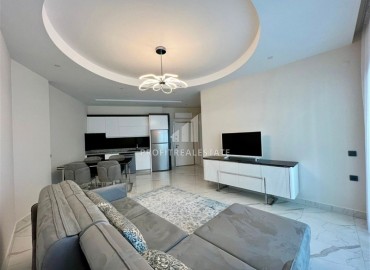 Элитная квартира с одной спальней, 60м², в фешенебельной резиденции с собственным пляжем в районе Каргыджак, Алания ID-18540 фото-2