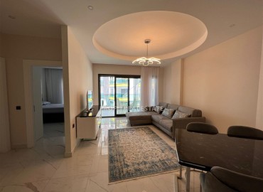 Элитная квартира с одной спальней, 60м², в фешенебельной резиденции с собственным пляжем в районе Каргыджак, Алания ID-18540 фото-3