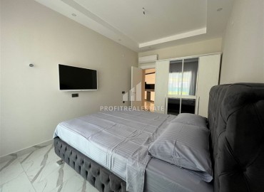 Элитная квартира с одной спальней, 60м², в фешенебельной резиденции с собственным пляжем в районе Каргыджак, Алания ID-18540 фото-6