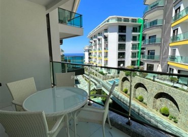 Элитная квартира с одной спальней, 60м², в фешенебельной резиденции с собственным пляжем в районе Каргыджак, Алания ID-18540 фото-9