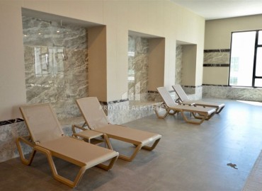 Элитная квартира с одной спальней, 60м², в фешенебельной резиденции с собственным пляжем в районе Каргыджак, Алания ID-18540 фото-14