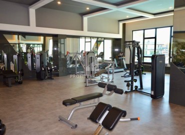 Элитная квартира с одной спальней, 60м², в фешенебельной резиденции с собственным пляжем в районе Каргыджак, Алания ID-18540 фото-15