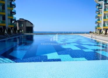 Элитная квартира с одной спальней, 60м², в фешенебельной резиденции с собственным пляжем в районе Каргыджак, Алания ID-18540 фото-16