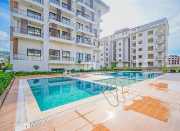 Стильные апартаменты с одной спальней, 50м², в новостройке с инфраструктурой и отличной локацией в Каргыджаке, Алания ID-18544 фото-1