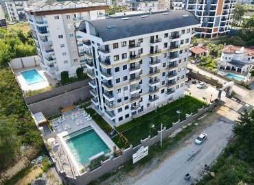 Апартаменты с одной спальней, 55м², в новой резиденции премиум класса 2024 года постройки в Авсалларе, Алания ID-18552 фото-1