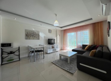 Стильная двухкомнатная квартира с застекленным балконом, 65м², в районе Алании - Авсаллар, в 700м от моря. ID-18558 фото-2