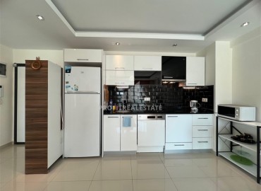 Стильная двухкомнатная квартира с застекленным балконом, 65м², в районе Алании - Авсаллар, в 700м от моря. ID-18558 фото-5