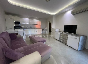 Меблированные апартаменты 1+1, 68м², на высоком этаже в элитном комплексе в 500м от моря в Махмутларе, Алания ID-18561 фото-3