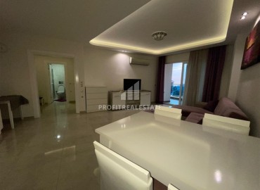 Меблированные апартаменты 1+1, 68м², на высоком этаже в элитном комплексе в 500м от моря в Махмутларе, Алания ID-18561 фото-7