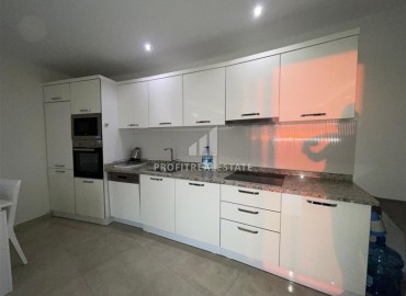 Меблированные апартаменты 1+1, 68м², на высоком этаже в элитном комплексе в 500м от моря в Махмутларе, Алания ID-18561 фото-8
