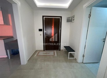 Меблированные апартаменты 1+1, 68м², на высоком этаже в элитном комплексе в 500м от моря в Махмутларе, Алания ID-18561 фото-10