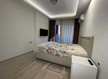 Меблированные апартаменты 1+1, 68м², на высоком этаже в элитном комплексе в 500м от моря в Махмутларе, Алания ID-18561 фото-13