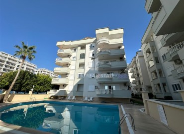 Готовая к проживанию, квартира с двумя спальнями, 100м², в комплексе с бассейном, в 100м от моря в районе Алании Оба ID-18565 фото-1