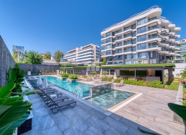 New 1+1 apartment with sea views, on the first coastline, in a luxury residence, Kargicak, Alanya ID-16834 фото-1