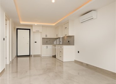 Двухкомнатная квартира, 59м², в комплексе премиум класса в центре Алании, 400м от пляжа Кейкубат ID-18568 фото-4