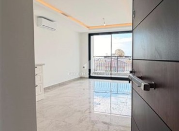 Двухкомнатная квартира, 59м², в комплексе премиум класса в центре Алании, 400м от пляжа Кейкубат ID-18568 фото-9