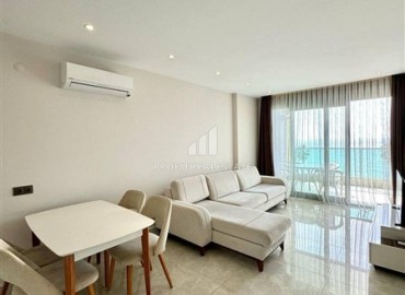 Стильная двухкомнатная квартира, 65м², в фешенебельном комплексе на первой береговой линии в Махмутларе, Алания. ID-18570 фото-3