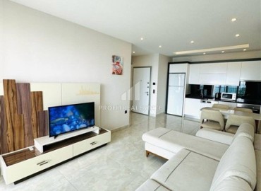 Стильная двухкомнатная квартира, 65м², в фешенебельном комплексе на первой береговой линии в Махмутларе, Алания. ID-18570 фото-6