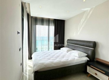 Стильная двухкомнатная квартира, 65м², в фешенебельном комплексе на первой береговой линии в Махмутларе, Алания. ID-18570 фото-8