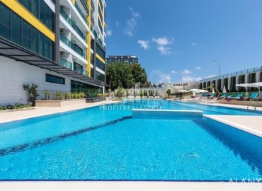 Стильная двухкомнатная квартира, 65м², в фешенебельном комплексе на первой береговой линии в Махмутларе, Алания. ID-18570 фото-12