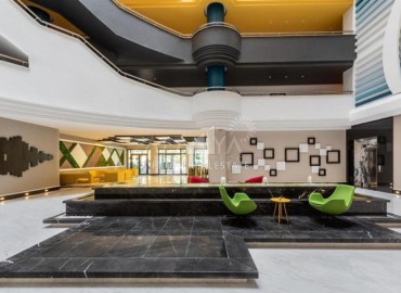 Стильная двухкомнатная квартира, 65м², в фешенебельном комплексе на первой береговой линии в Махмутларе, Алания. ID-18570 фото-17