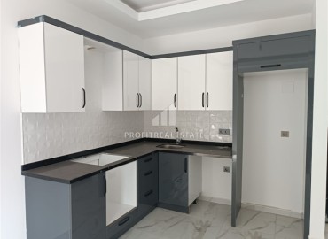 Квартира с одной спальней, 50м², в новом комплексе с бассейном в центре Махмутлара, Алания, по выгодной цене ID-18571 фото-3