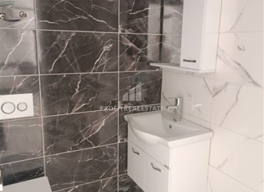 Квартира с одной спальней, 50м², в новом комплексе с бассейном в центре Махмутлара, Алания, по выгодной цене ID-18571 фото-7