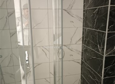 Квартира с одной спальней, 50м², в новом комплексе с бассейном в центре Махмутлара, Алания, по выгодной цене ID-18571 фото-8