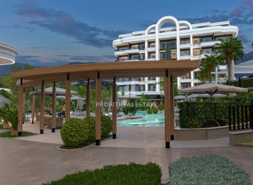 Фешенебельная двухкомнатная квартира, 57м², в элитном проекте на 1-й береговой линии в районе Кестель, Алания на этапе строительства ID-18576 фото-5