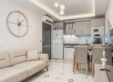 Элегантная квартира с двумя спальнями, 72м², в комплексе премиум класса в 200м от моря в Махмутларе, Алания ID-18581 фото-4