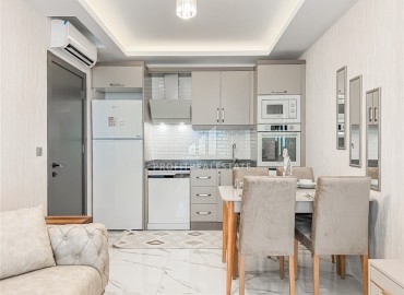 Элегантная квартира с двумя спальнями, 72м², в комплексе премиум класса в 200м от моря в Махмутларе, Алания ID-18581 фото-7