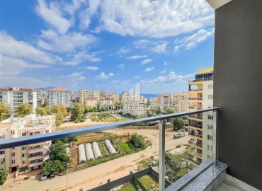 Элегантная квартира с двумя спальнями, 72м², в комплексе премиум класса в 200м от моря в Махмутларе, Алания ID-18581 фото-17