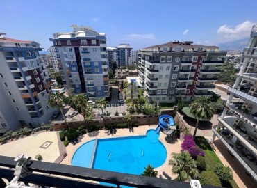 Готовая к проживанию, квартира с одной спальней, 75м², с видом на горы в районе Алании Тосмур под ВНЖ ID-18593 фото-12