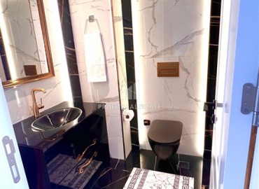 Элегантная двухкомнатная квартира, 53,5м², в новом комплексе премиум класса на первой береговой линии в центре Алании ID-18600 фото-13