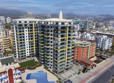 Меблированная трехкомнатная квартира, 70м² в новом элитном комплексе на первой береговой линии Махмутлара, Алания ID-18619 фото-1