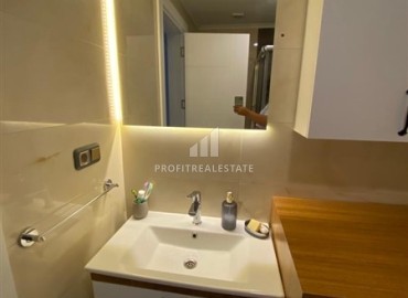 Меблированная трехкомнатная квартира, 70м² в новом элитном комплексе на первой береговой линии Махмутлара, Алания ID-18619 фото-7