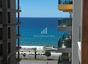 Меблированная трехкомнатная квартира, 70м² в новом элитном комплексе на первой береговой линии Махмутлара, Алания ID-18619 фото-10