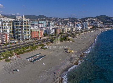 Меблированная трехкомнатная квартира, 70м² в новом элитном комплексе на первой береговой линии Махмутлара, Алания ID-18619 фото-11