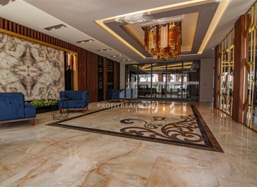 Меблированная трехкомнатная квартира, 70м² в новом элитном комплексе на первой береговой линии Махмутлара, Алания ID-18619 фото-14