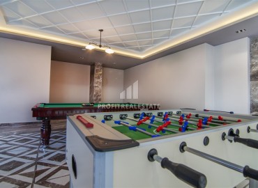 Меблированная трехкомнатная квартира, 70м² в новом элитном комплексе на первой береговой линии Махмутлара, Алания ID-18619 фото-15