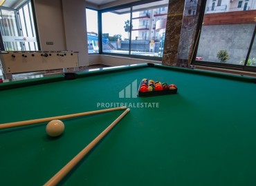 Меблированная трехкомнатная квартира, 70м² в новом элитном комплексе на первой береговой линии Махмутлара, Алания ID-18619 фото-16