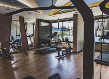 Меблированная трехкомнатная квартира, 70м² в новом элитном комплексе на первой береговой линии Махмутлара, Алания ID-18619 фото-17